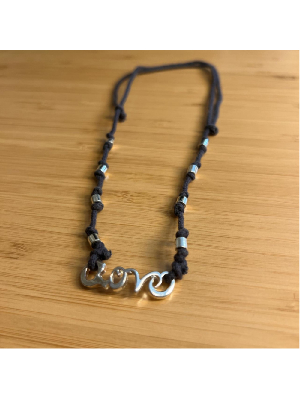 Adjustable navy blue and silver ‘love’ necklace